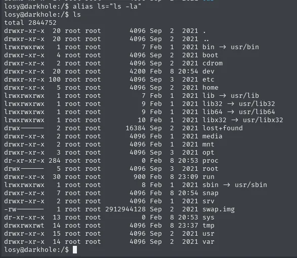 Listado de / con el alias aplicado, mostrando permisos y ficheros ocultos, incluido swap.img y los enlaces simbólicos de bin, lib y sbin