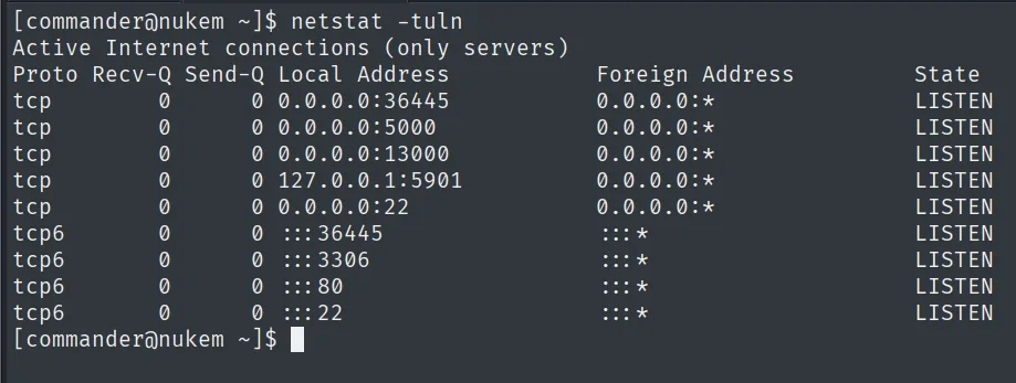 netstat -tuln en nukem mostrando 127.0.0.1:5901 en estado LISTEN (servidor VNC local)