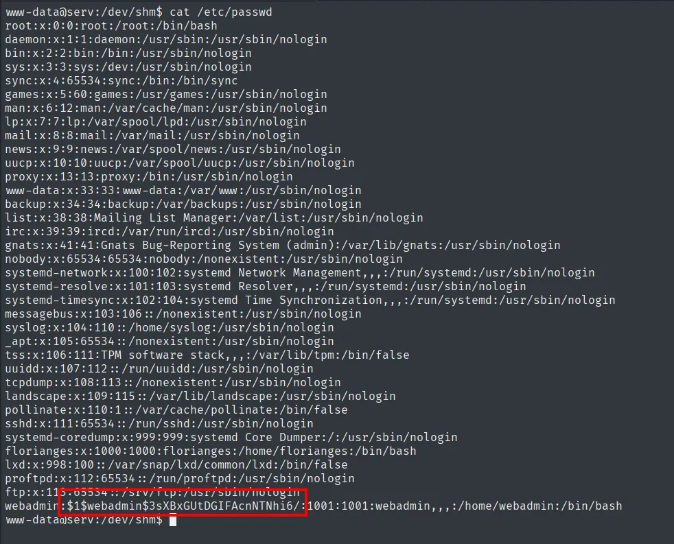 cat /etc/passwd desde la shell de www-data: webadmin con su hash md5crypt $1$webadmin$...