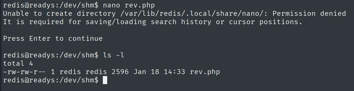 Como redis se crea rev.php en /dev/shm; ls -l confirma rev.php propiedad de redis