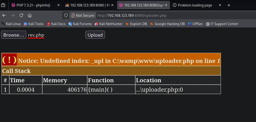 uploader.php con "Browse... rev.php" seleccionado y el aviso PHP "Undefined index: _upl in C:\wamp\www\uploader.php"